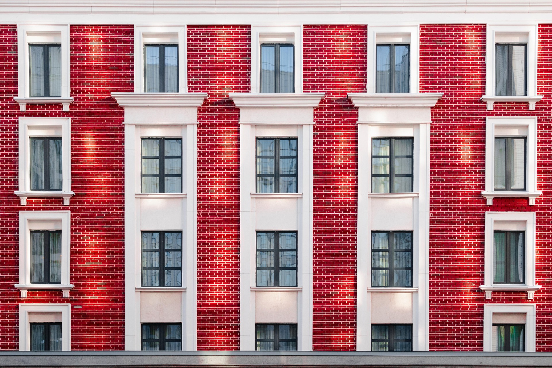 Photo of a modern replica Georgian apartment housing using uPVC instead of wood