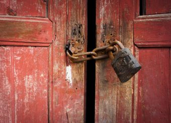 Image of a padlock that needs a lock replacement